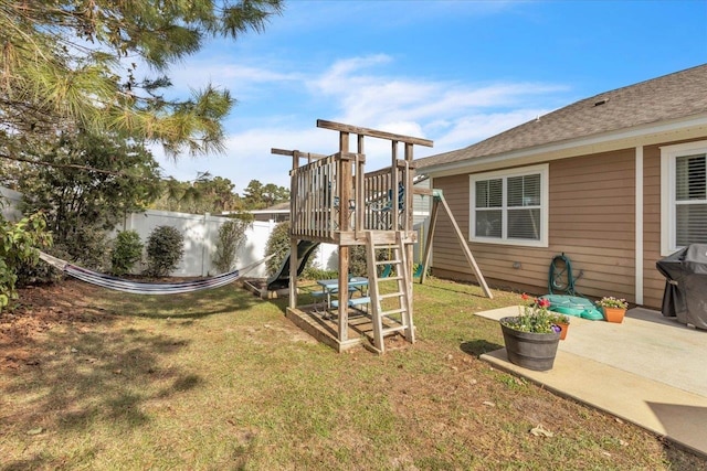 view of jungle gym with a yard