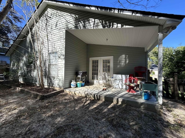 rear view of house with a patio