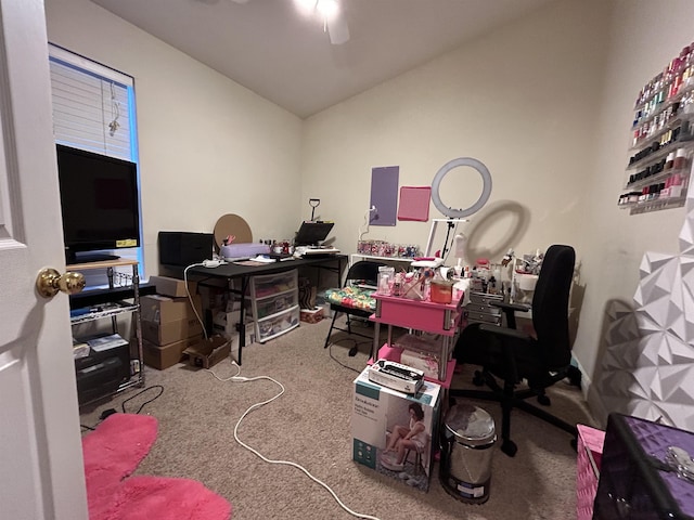 home office with lofted ceiling, carpet, and ceiling fan