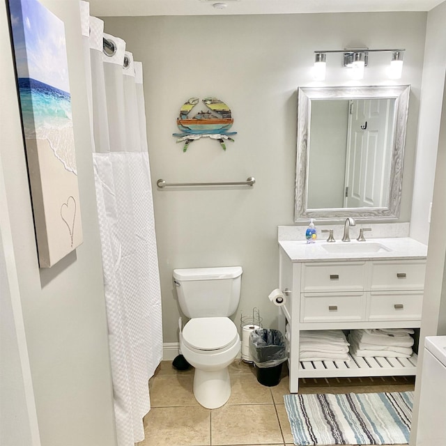 122 Seascape Dr Unit 1406, Destin, FL 32550 - full bathroom with vanity, tile patterned flooring, toilet, and curtained shower