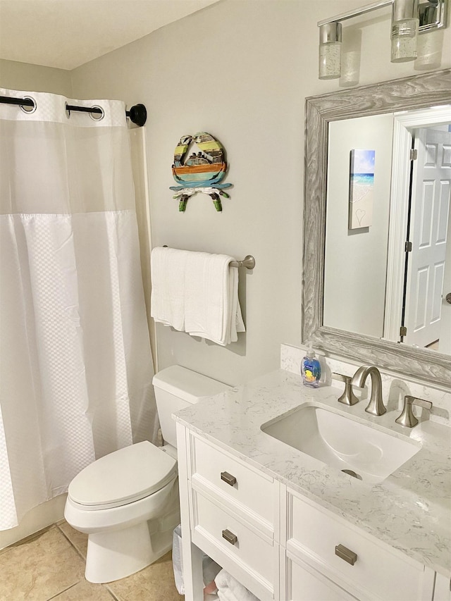 122 Seascape Dr Unit 1406, Destin, FL 32550 - full bath with vanity, toilet, a shower with curtain, and tile patterned floors