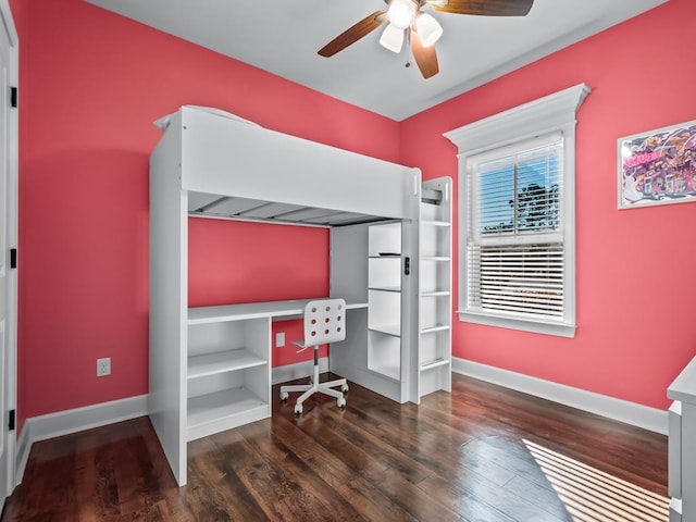 bedroom featuring ceiling fan and dark wood-type flooring