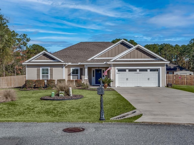 view of front facade featuring a garage and a front lawn