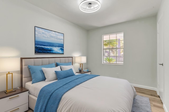 bedroom with light hardwood / wood-style flooring