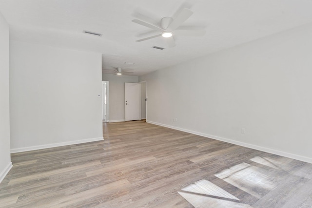 unfurnished room featuring ceiling fan and light hardwood / wood-style flooring