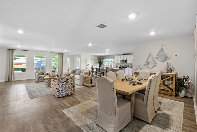 dining room featuring light hardwood / wood-style floors