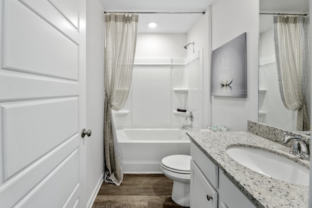 full bathroom with vanity, hardwood / wood-style flooring, toilet, and shower / bathtub combination with curtain