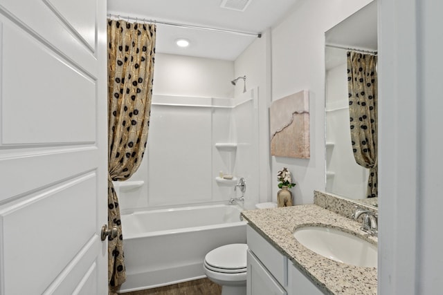 full bathroom featuring toilet, shower / tub combo with curtain, vanity, and hardwood / wood-style flooring