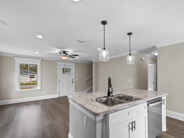 kitchen with stainless steel dishwasher, hanging light fixtures, sink, white cabinets, and an island with sink