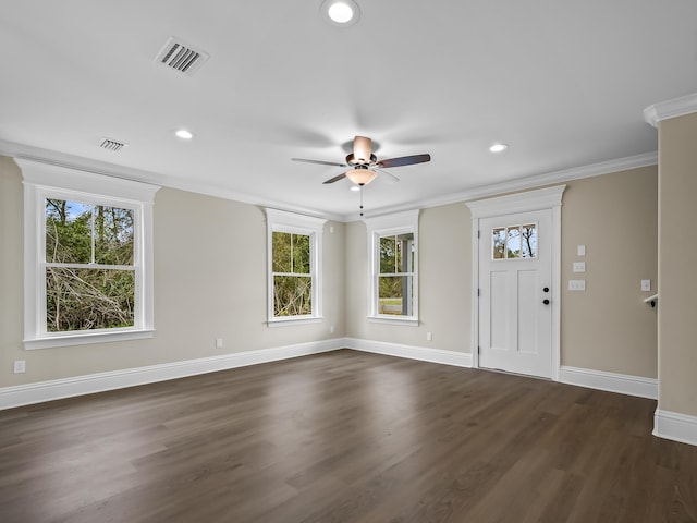 foyer featuring ceiling fan, dark hardwood / wood-style flooring, and crown molding