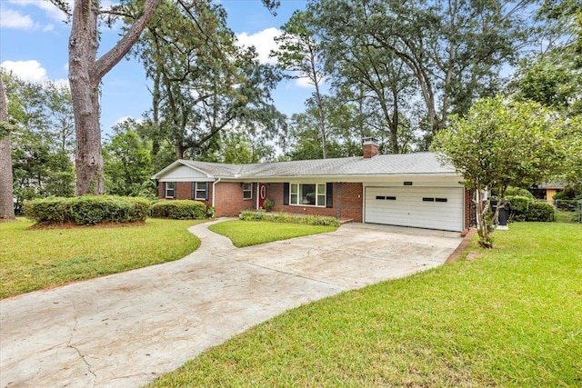 ranch-style home with a front yard and a garage