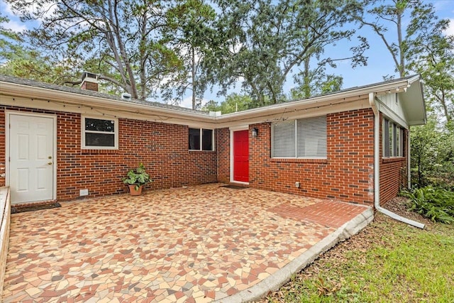 view of front of property with a patio