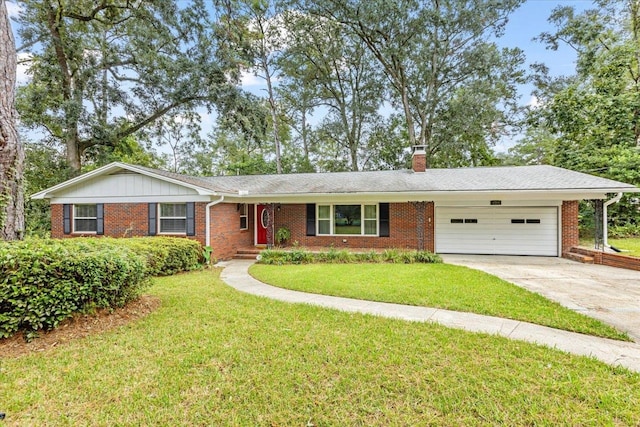 single story home featuring a front yard and a garage