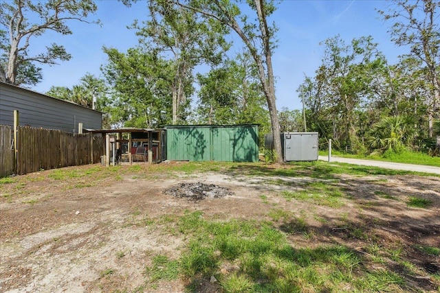 209 SE 10th St, Steinhatchee, FL 32359 - view of yard with an outdoor structure and an outbuilding