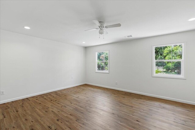 209 SE 10th St, Steinhatchee, FL 32359 - spare room with ceiling fan, wood finished floors, baseboards, and recessed lighting