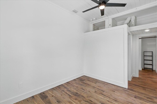 209 SE 10th St, Steinhatchee, FL 32359 - spare room featuring dark wood finished floors, baseboards, and wood ceiling