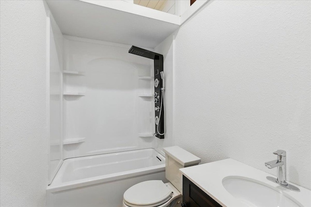 209 SE 10th St, Steinhatchee, FL 32359 - bathroom featuring a textured wall, toilet,  shower combination, and vanity