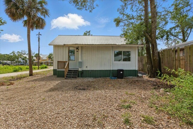 209 SE 10th St, Steinhatchee, FL 32359 - view of front of home featuring metal roof