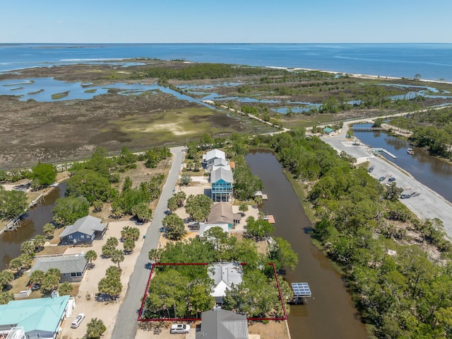 35 Sunrise Ln, Panacea, FL 32346 - aerial overview of property's location with a large body of water and property boundaries highlighted