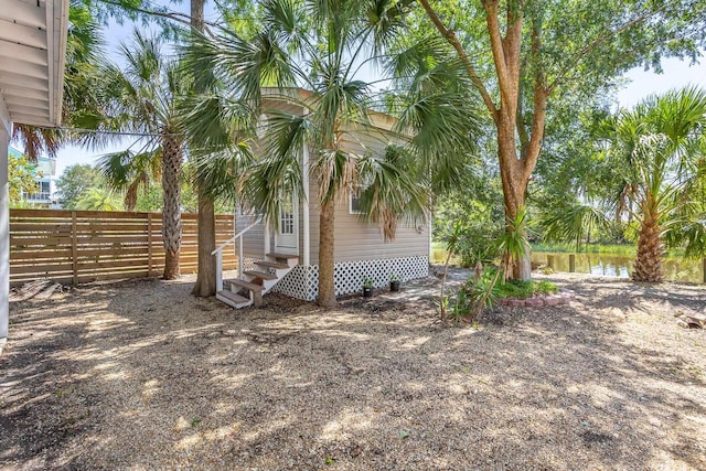 35 Sunrise Ln, Panacea, FL 32346 - view of yard with entry steps, fence, and a water view