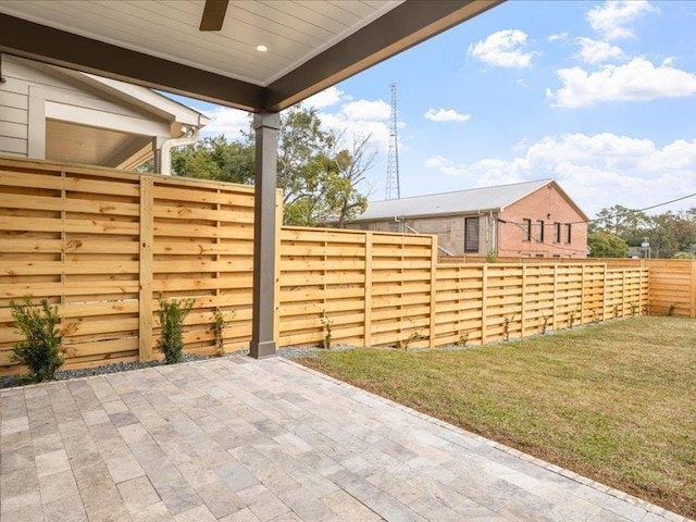 view of patio / terrace featuring ceiling fan