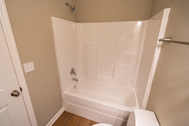 2253 Del Carmel Way, Tallahassee, FL 32303 - bathroom featuring toilet, wood finished floors, and baseboards