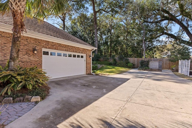 view of side of property featuring a garage