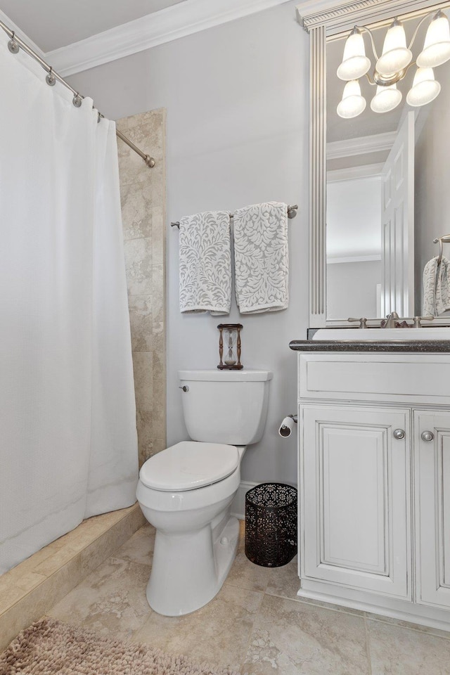 bathroom featuring vanity, ornamental molding, a chandelier, and walk in shower