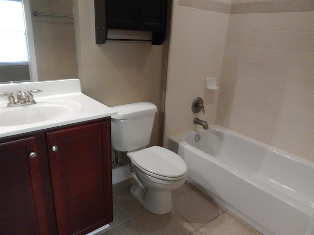 full bathroom with tile patterned flooring, vanity, shower / bathing tub combination, and toilet