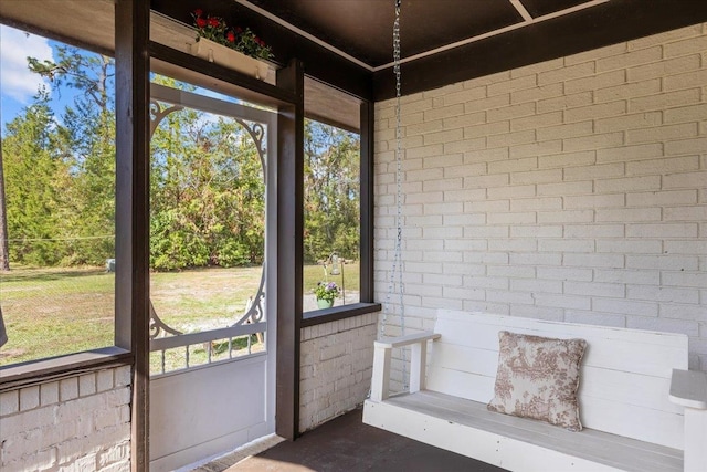 unfurnished sunroom with plenty of natural light