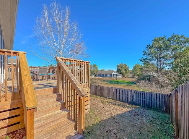 view of yard with a wooden deck