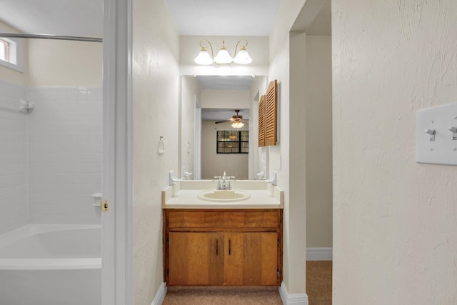 bathroom with ceiling fan, vanity, and bathtub / shower combination