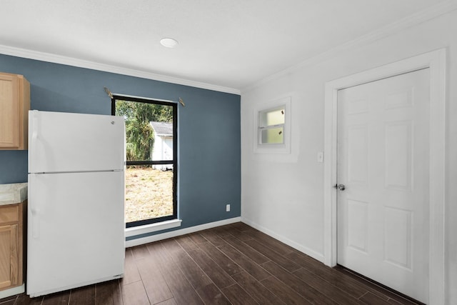 interior space featuring crown molding and dark wood-type flooring