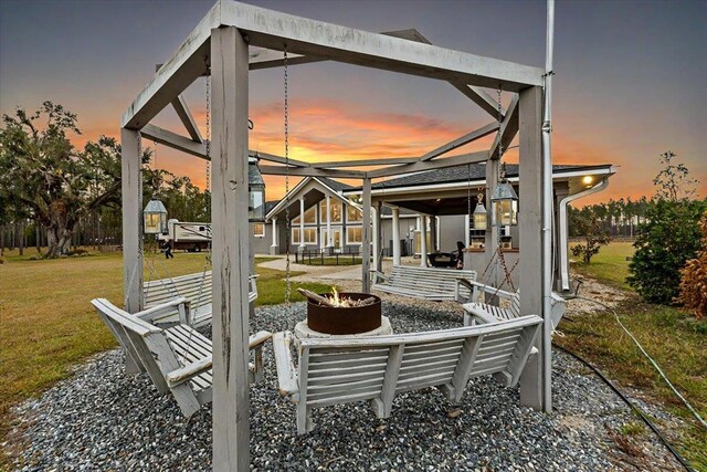 7087 Valhalla Ranch Dr, Perry, FL 32348 - view of patio with a fire pit