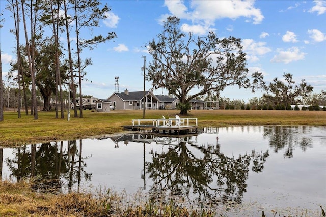7087 Valhalla Ranch Dr, Perry, FL 32348 - dock with a water view and a lawn