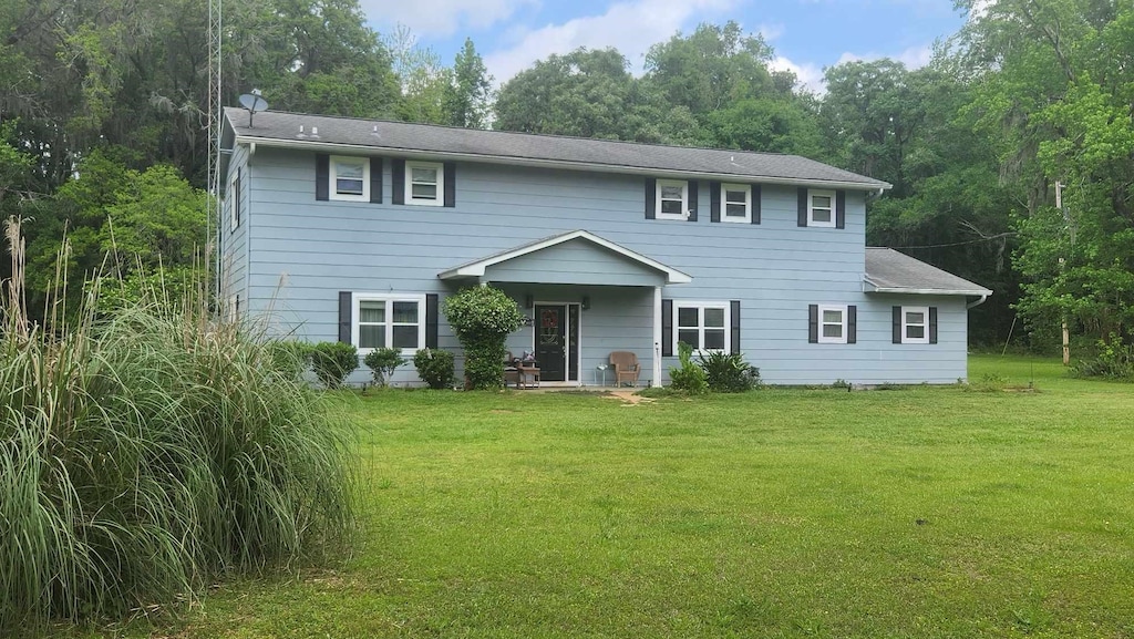 11072 Tung Grove Rd, Tallahassee, FL 32317 - colonial home featuring a front yard