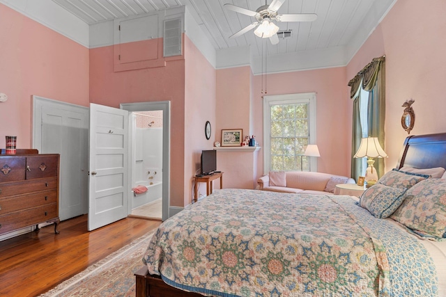 bedroom featuring wooden ceiling, visible vents, ceiling fan, and wood finished floors