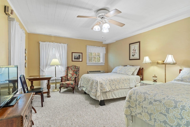 carpeted bedroom with a ceiling fan