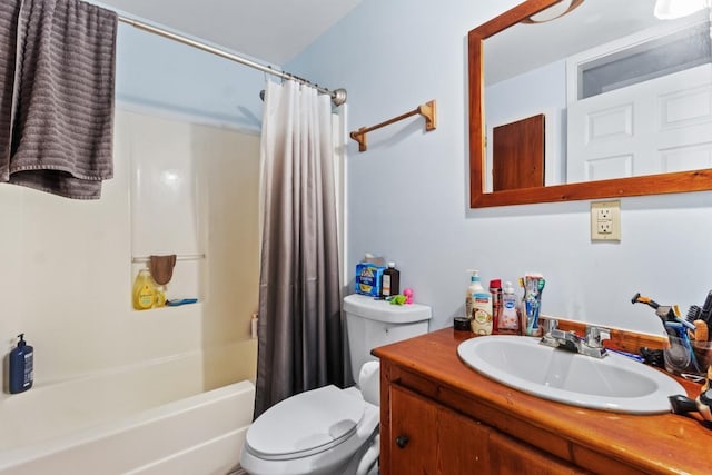 full bathroom featuring vanity, toilet, and shower / bathtub combination with curtain