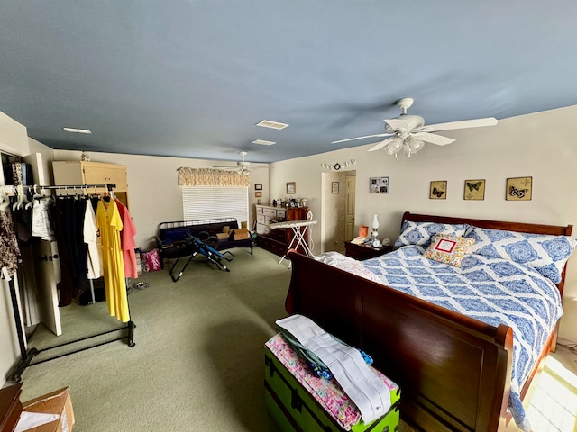 bedroom featuring ceiling fan and carpet floors