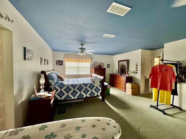 bedroom featuring ceiling fan and carpet floors