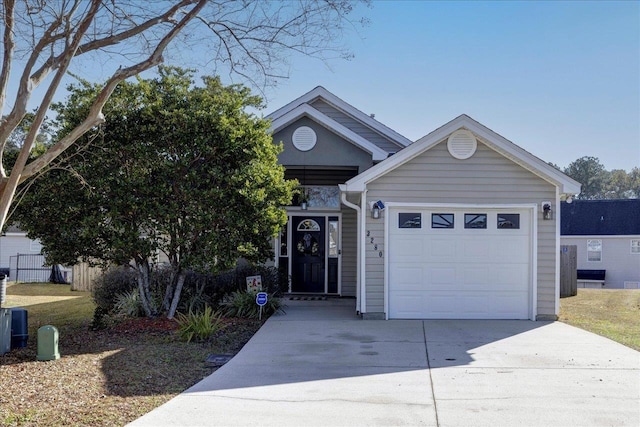 view of front of home with a garage