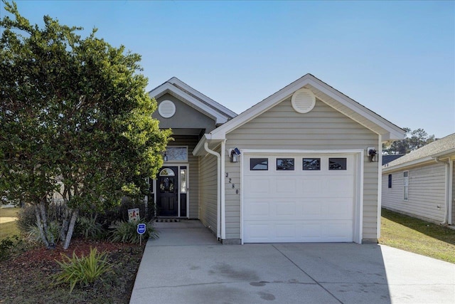 view of front of home with a garage