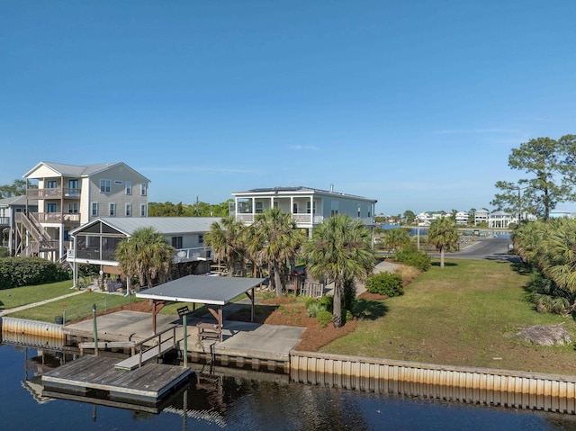 1548 Shell Point Rd, Crawfordville, FL 32327 - dock with a water view, a lawn, and boat lift