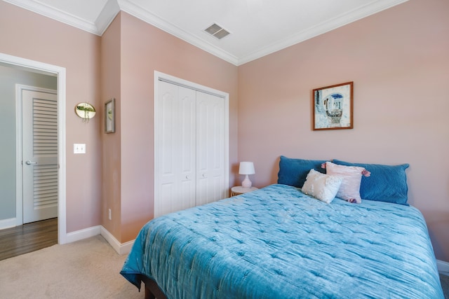 1548 Shell Point Rd, Crawfordville, FL 32327 - bedroom featuring ornamental molding, baseboards, carpet floors, and a closet
