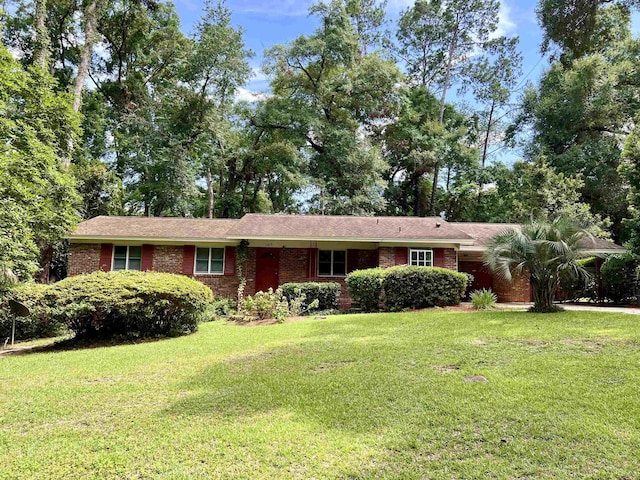 ranch-style house with a front yard