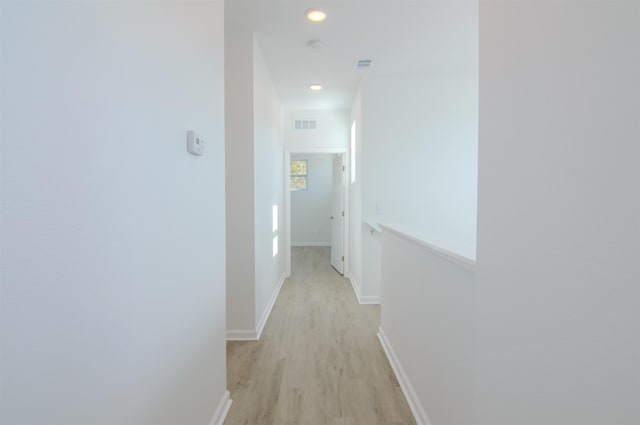 hall featuring light hardwood / wood-style floors