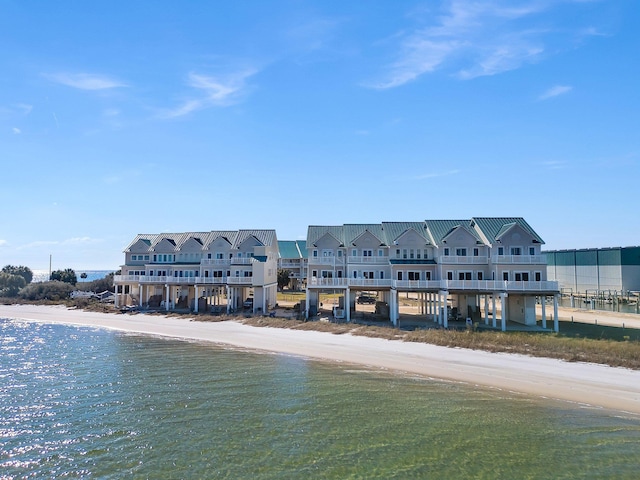 property view of water featuring a beach view