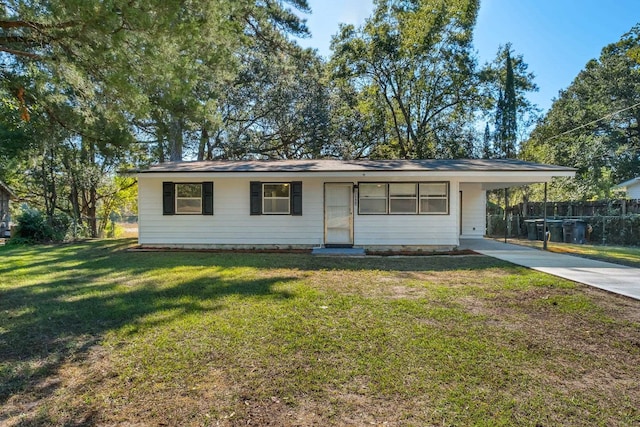 single story home with a carport and a front yard