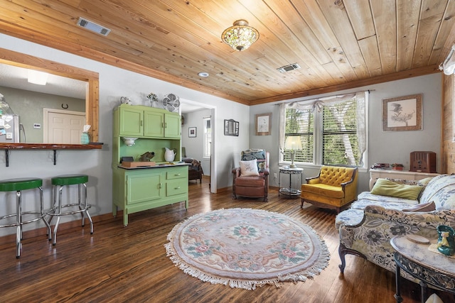 sitting room featuring crown molding, wooden ceiling, and dark hardwood / wood-style flooring